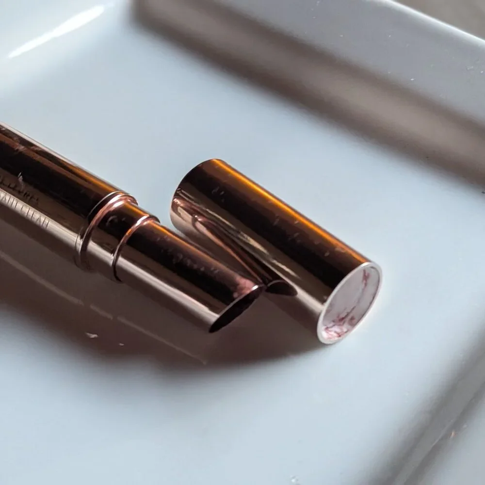 goop Beauty | Clean Nourishing Lip Balm | Garnet: a translucent deep burgundy
